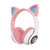 Auriculares Bluetooth PartyCAT de color rosa con orejas de gato y luces LED multicolores.