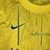 Kit Infantil Al-Nassr I Nike 23/24 - Amarelo com detalhes em azul - GOL DE PLACA ESPORTES 