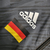 Jaqueta Corta-Vento Seleção da Alemanha 23/24 - Masculina Adidas - Preta com detalhes em vermelho e branco - GOL DE PLACA ESPORTES 