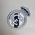 Camisa Real Madrid Treino 24/25 polo - Jogador Adidas Masculina - Branca com detalhes em azul - loja online