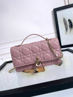 Bolsa Christian Dior em couro metálasse