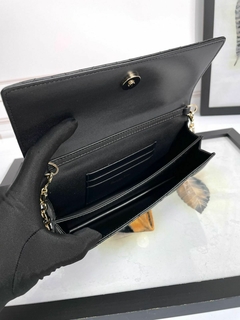 Bolsa Christian Dior em couro metálasse na internet