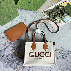 Bolsa Gucci quadrada pequena feita tecido com couro - Elegância e Você