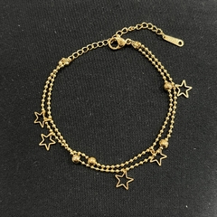 PULSERA ACERO DORADO CON PELOTITAS Y ESTRELLITAS