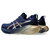 Tênis ASICS Novablast 4 Platinum - Masculino - Azul Marinho com Dourado na internet