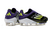 Botines F50+ Fast Reborn Terreno Firme en color negro y morado con detalles en amarillo.