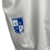 Kit Infantil Universidad Católica I Under Armour 23/24 - Branco com detalhes em azul e vermelho na internet