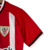 Kit Infantil Atlético de Bilbao I Castore 23/24 - Vermelho com detalhes em branco e preto