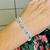 Pulseira Folheada Dupla Olho Grego com Strass Prateada - comprar online