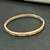 Bracelete dourado inspiração cartier cravejado