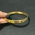 Bracelete aço dourado Gucci