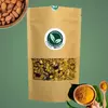 Embalagem de granola Madame Canella de cúrcuma e amêndoas, com ingredientes visíveis, como amêndoas e cúrcuma em pó.