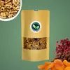 Pacote de Granola Madame Canella com Frutas e Nozes, mostrando ingredientes como nozes, damascos e frutas secas em um fundo verde.