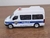 Miniatura Van POLICE 911 Metal e Fricção Escala 1/32 Branca na internet