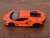 Miniatura Lamborghini Revuelto Kinsmart 1/38 Metal e Fricção Laranja