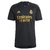 Camisa preta do Real Madrid III 2023/2024 para torcedores masculinos, com detalhes em dourado.