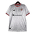 Camisa branca do Athletic Bilbao III 2023/2024 com detalhes vermelhos e logo da Castore.