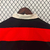 Agasalho corta vento Flamengo Dupla Face nas cores vermelha, preta e bege, com logo da Adidas e do clube.