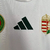 Camisa branca masculina da seleção da Hungria, modelo 2024/25, com detalhes em verde e vermelho, e logos da Adidas e da federação húngara.