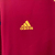 Camisa retrô vermelha da seleção da Espanha, modelo masculino da Adidas, com detalhes em amarelo e escudo da equipe.