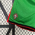 Calção masculino Nike verde da Seleção Portuguesa, com detalhes em vermelho e logo da marca.