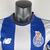 Camisa masculina do FC Porto para a temporada 2023/2024, em azul e branco, modelo jogador da New Balance.