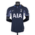 Camisa masculina do Tottenham II 2023/2024 da Nike, na cor azul escura, com detalhes em cinza e logo do clube.