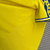 Camisa de torcedor masculina amarela da equipe Cádiz, temporada 2024/25, com detalhes em azul e design moderno, da macron.