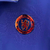 Agasalho corta vento da Nike, modelo Chelsea Dupla Face, na cor azul com detalhes em ciano e logo da equipe.