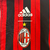 Agasalho Corta Vento AC Milan Dupla Face 2024/25 da Adidas na cor branca com detalhes em dourado e preto.