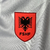 camisa-albania-macron-ii-2023-torcedor-masculina-branca-branco-vermelha-vermelho-preto-preta-camisas-manto-blusa-oficial-original-mantos-blusas-masculino-futebol-time-segunda-segundo-reserva