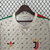 Camisa torcedor masculina da Juventus 2024/25, na cor bege, com detalhes em verde e vermelho e estampa do logo da marca.