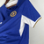 Camisa masculina do Chelsea na cor azul royal, modelo 2023/2024 da Nike, com logo do time e detalhes em branco.