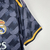 Camisa do Real Madrid II 2023/2024 para torcedores masculinos, na cor preta, com detalhes em amarelo e logo da Adidas.