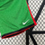 Calção masculino Nike verde da Seleção Portuguesa, com detalhes em vermelho e logo da marca.