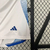 Calção branco masculino da seleção italiana de futebol, da marca Adidas, com detalhes em azul e logo da Itália.