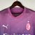 Camisa rosa do AC Milan III 2023/2024, modelo torcedor masculino da Puma, com design em degradê e logo do clube.