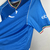 Camisa torcedor masculina do Napoli para a temporada 2023/2024, na cor azul, com detalhes em verde, branco e vermelho.