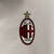 Agasalho Corta Vento AC Milan Dupla Face 2024/25 da Adidas na cor branca com detalhes em dourado e preto.