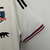 Camisa branca do Colo Colo I 2023/2024 para torcedores masculinos da Adidas, com detalhes em vermelho e preto.