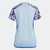 Camisa feminina de torcedor da Espanha 2023/2024, azul celeste, com detalhes florais em roxo e logo da Adidas.