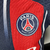 Camisa masculina do PSG I 2023/2024, modelo jogador, na cor azul marinho com detalhes em vermelho e logo da Nike.