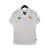 Camisa branca do Real Madrid Retrô I 2002/2003 para torcedores masculinos, da Adidas, com logo do time e da marca.