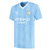 Camisa masculina do Manchester City I 2023/2024, na cor azul, fabricada pela Puma, com detalhes em relevo e logo do time.