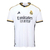 Camisa branca do Real Madrid I 2023/2024 para torcedores masculinos da Adidas, com detalhes em dourado e logo da equipe.