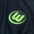 Camisa masculina do time Wolfsburg II 2022/2023, na cor verde escuro, com detalhes em neon e logos da Nike e Volkswagen.