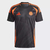 Camisa de torcedor masculina Adidas na cor preta com detalhes laranja, representando a seleção da Colômbia para a temporada 2024/25.