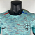 Camisa de jogador masculina do Barcelona III 2023/2024 da Nike, na cor azul ciano, com detalhes em vermelho e azul nas mangas e logo do clube e da marca.