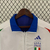 Agasalho Corta Vento Itália Dupla Face 2023/24 da Adidas, na cor azul e branca, exibindo o logo da seleção italiana e detalhes em verde nas mangas.

