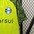 Camisa de treino amarela do Grêmio, modelo 2024/25, com detalhes em azul e logotipo da Umbro.

